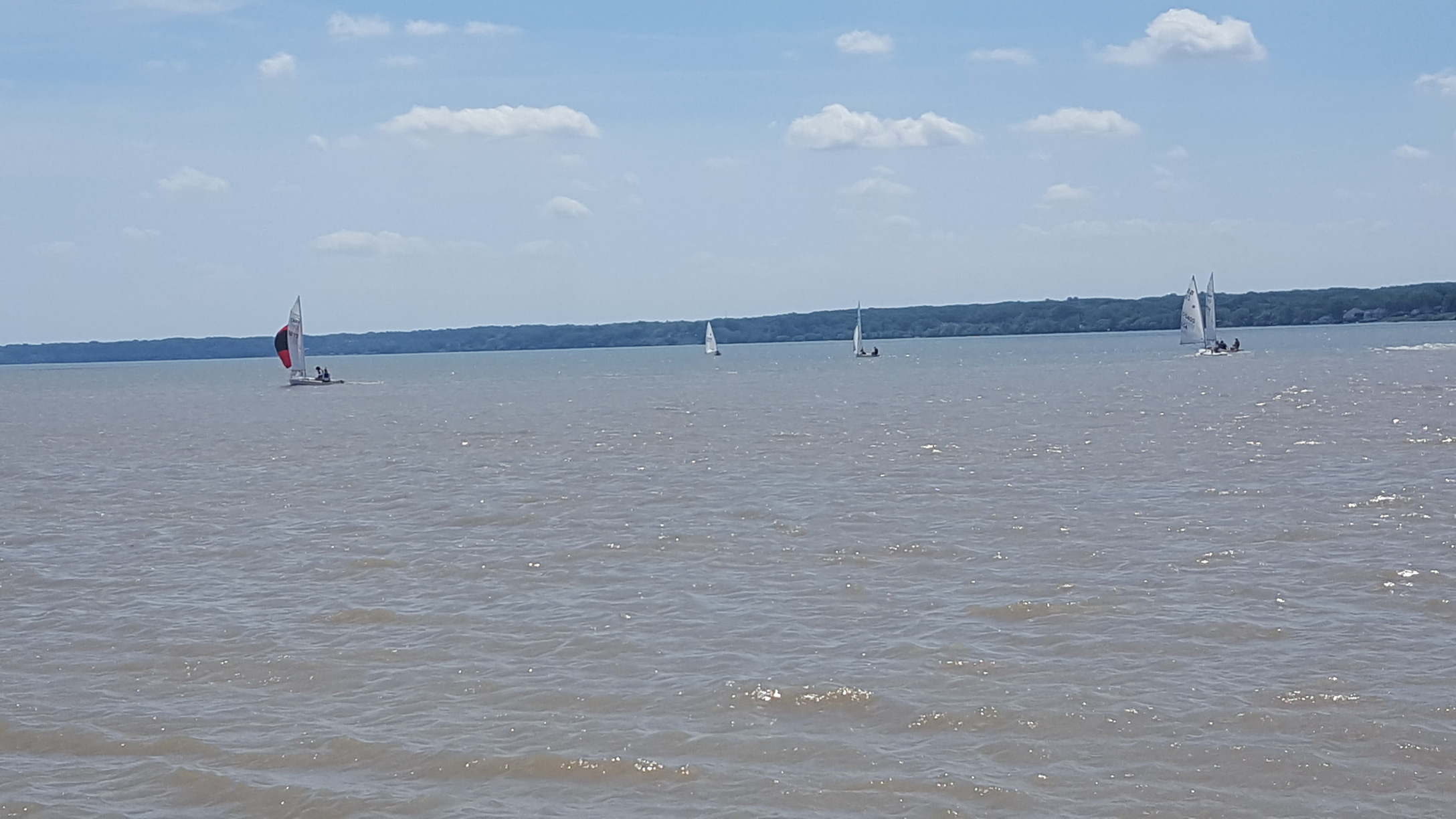 Boats sailing on Lake Ontario in Charlotte, NY